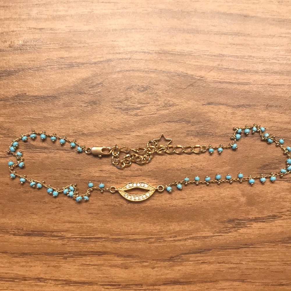 Blue beaded choker with lips